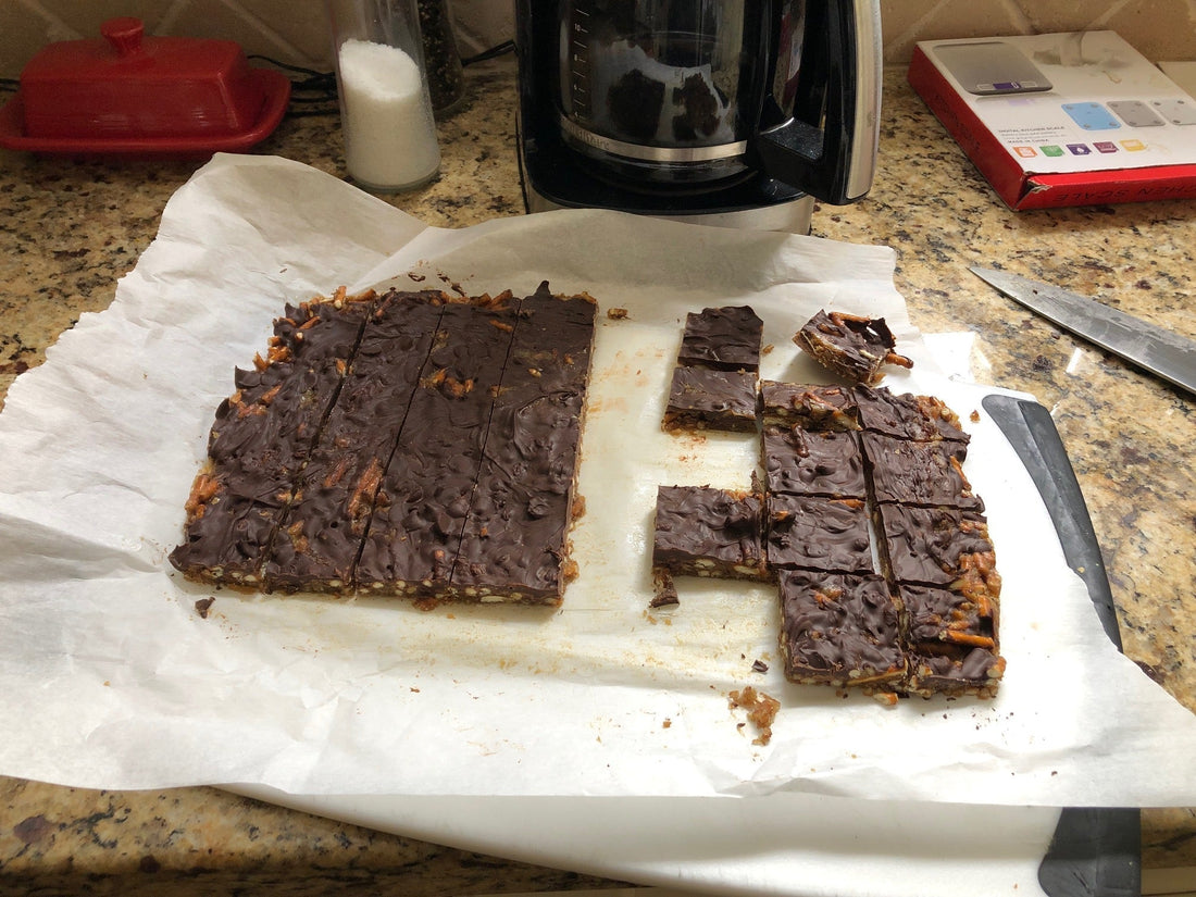 Caramel pretzel crack bars with chocolate topping and pretzel base