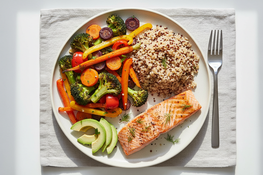 Balanced dinner plate showing blood sugar stability method: half vegetables, quarter protein, quarter whole grains, with healthy fats